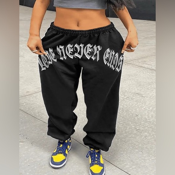“LOVE NEVER ENDS”. Printed Graphics Across Front Black W/ White Print Sweatpants - Picture 1 of 7